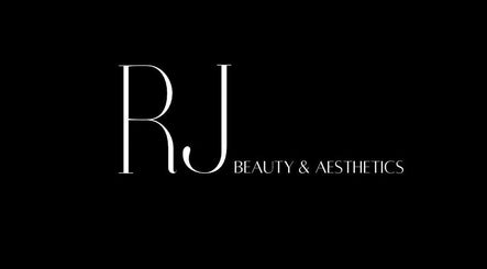 RJ Beauty & Aesthetics logo displayed on a sleek black background in Dalkeith, Scotland, GB.