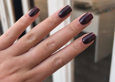 Dark polished nails at RJ Beauty & Aesthetics, Dalkeith, Scotland, GB showcasing elegance.