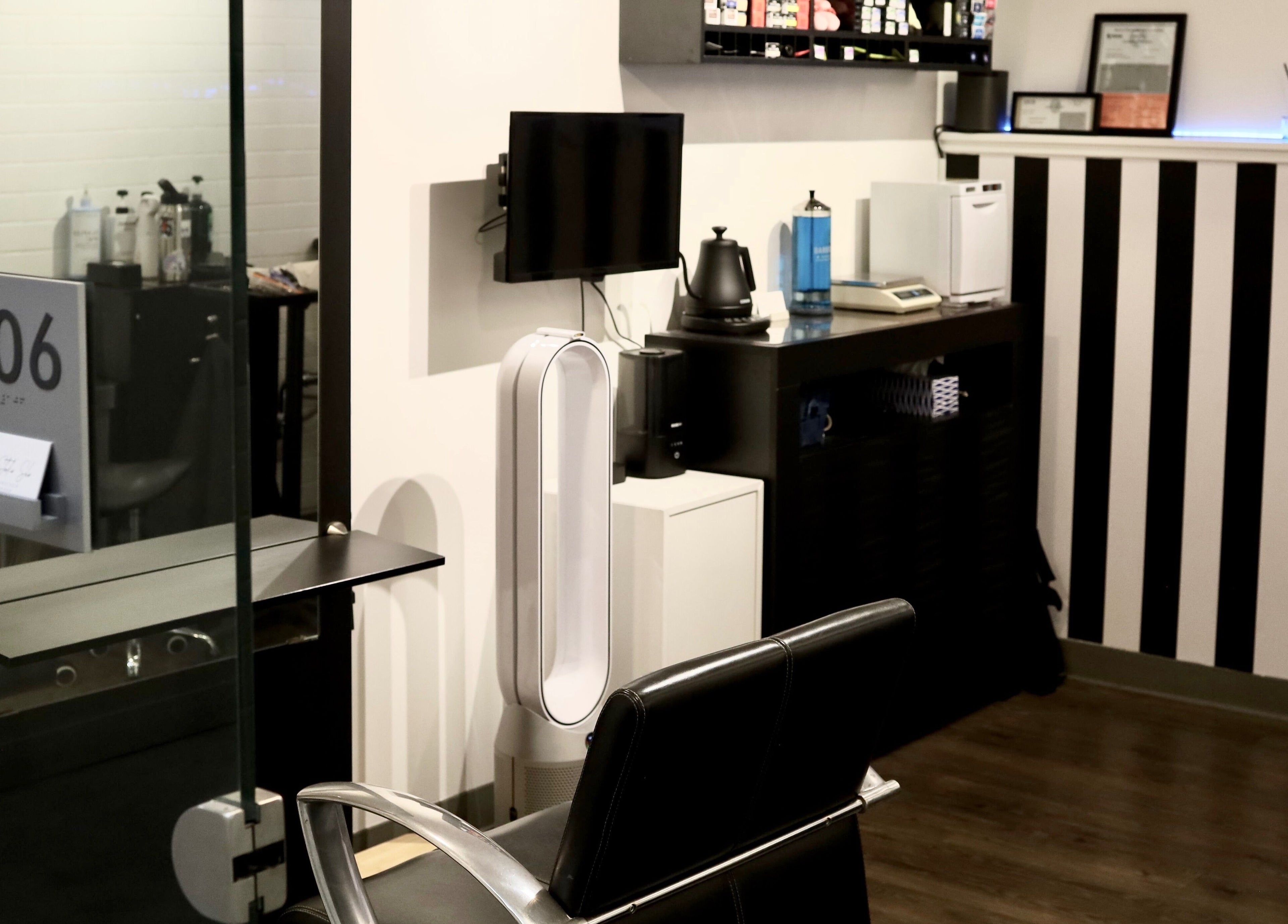 Modern interior of Hair Studio Sho in San Francisco, California, US, featuring stylish decor and salon chair.