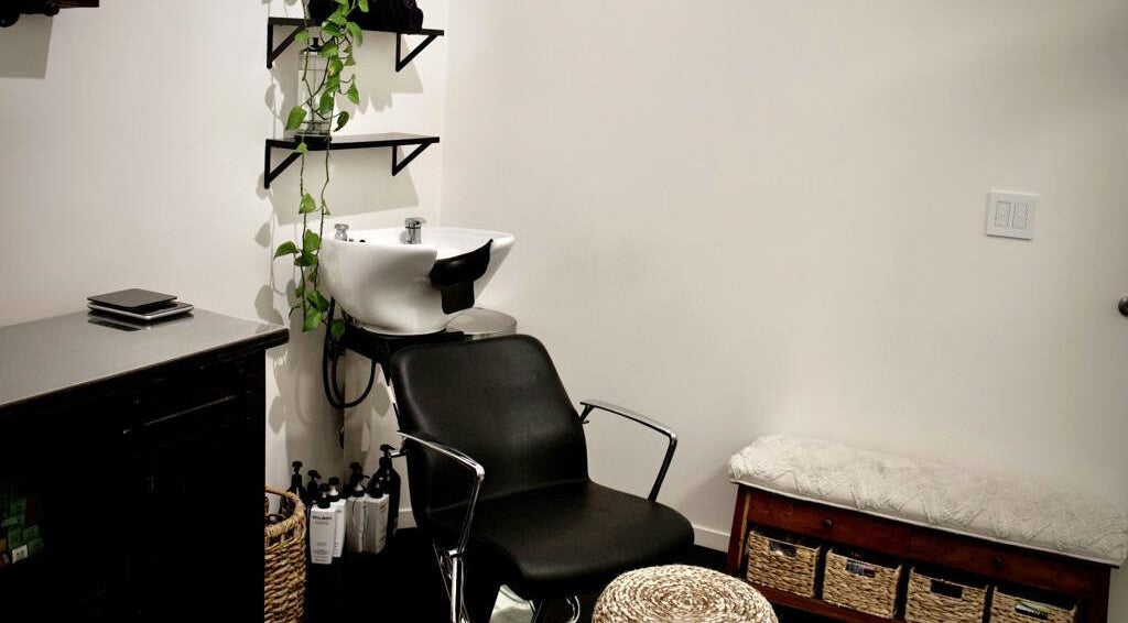 Modern salon chair and sink at Hair Studio Sho - Sunnyvale, offering top beauty services in Sunnyvale, California, US.
