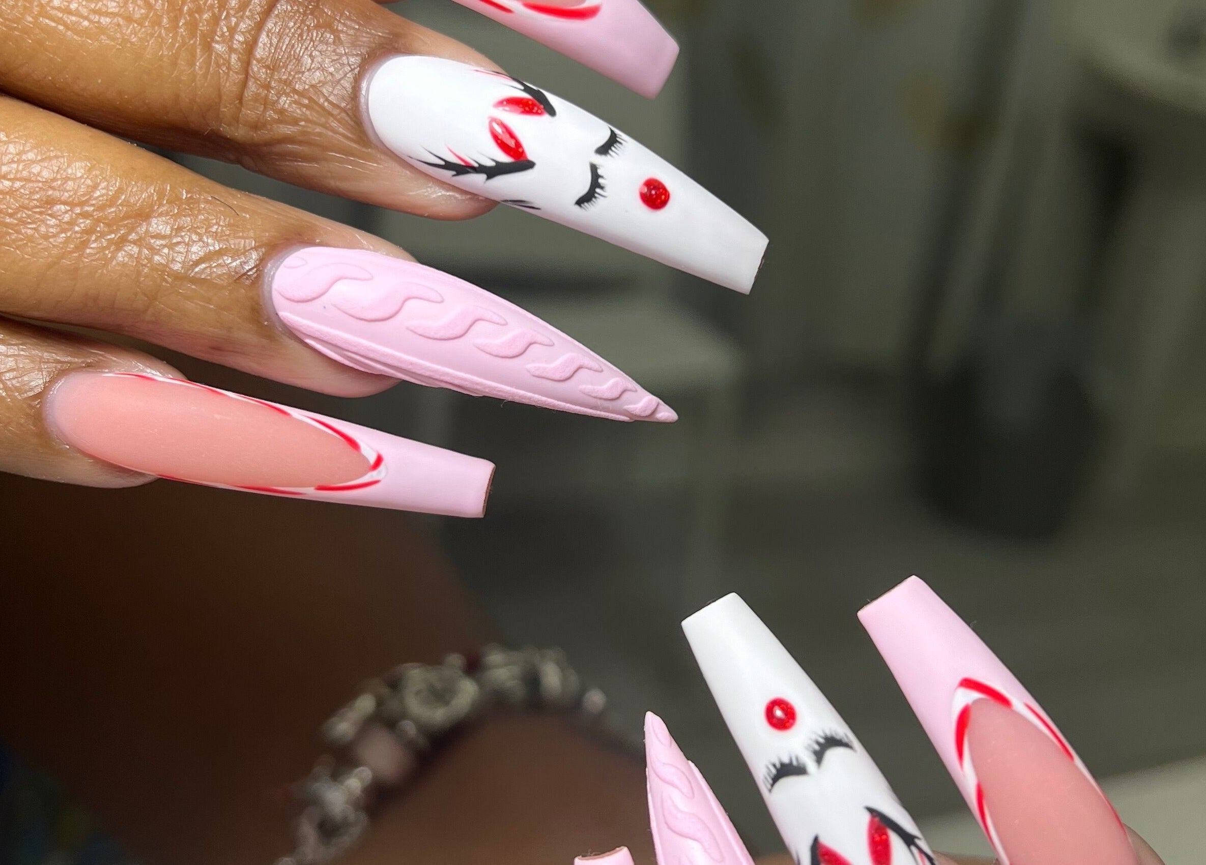 Stylish pink and white nails at XxClusive Nails, Bridgetown, Saint Michael, BB, featuring unique designs.