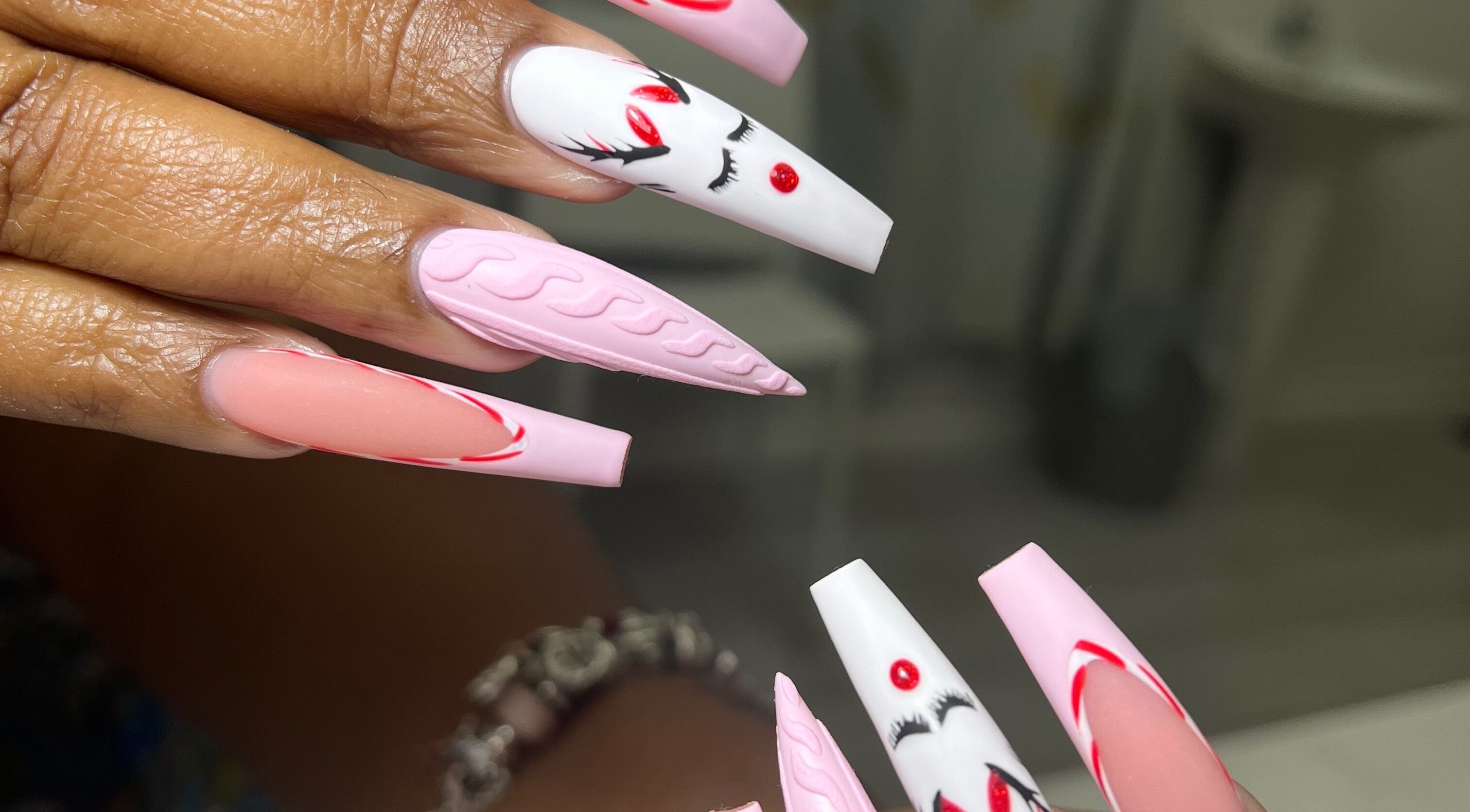 Stylish pink and white nails at XxClusive Nails, Bridgetown, Saint Michael, BB, featuring unique designs.