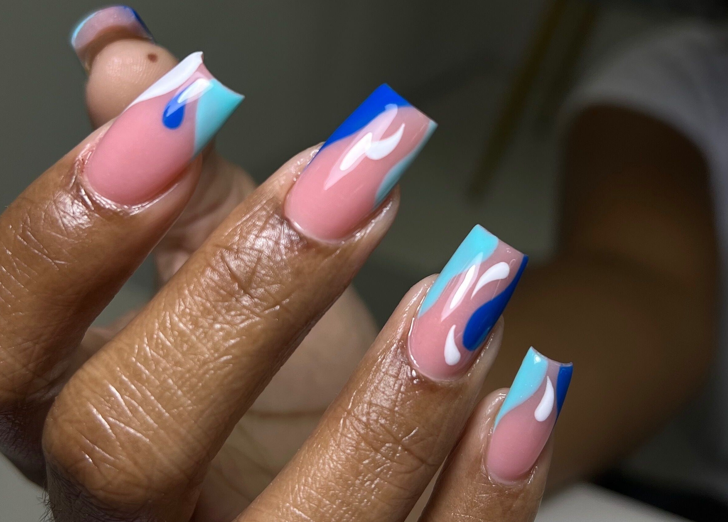 Stylish blue and pink nail art from XxClusive Nails in Bridgetown, Saint Michael, BB.