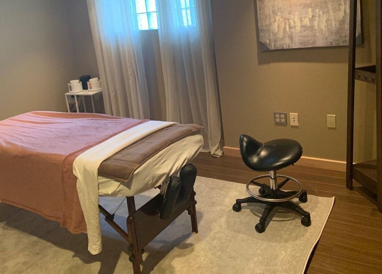 Cozy massage room at Rest, Relax, Rejoice Massage - LLC, Kent, Washington, US, featuring a massage table.