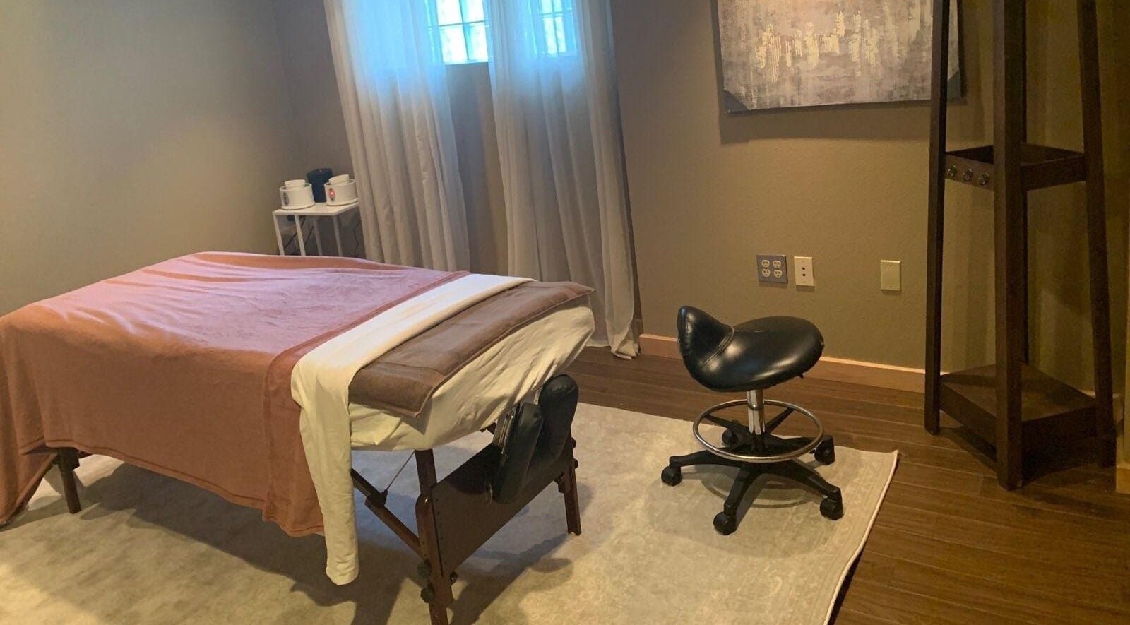 Cozy massage room at Rest, Relax, Rejoice Massage - LLC, Kent, Washington, US, featuring a massage table.