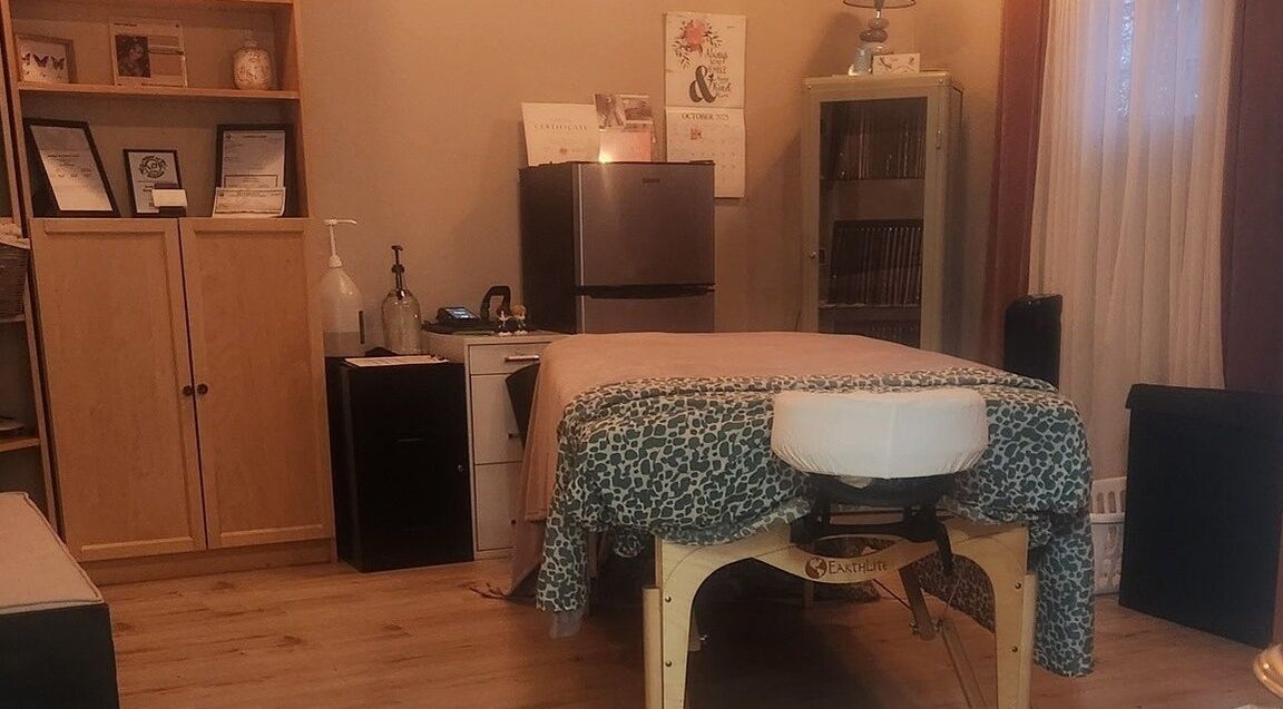 Cozy massage room at Rest, Relax, Rejoice Massage - LLC in Kent, Washington, US, ready for relaxation.