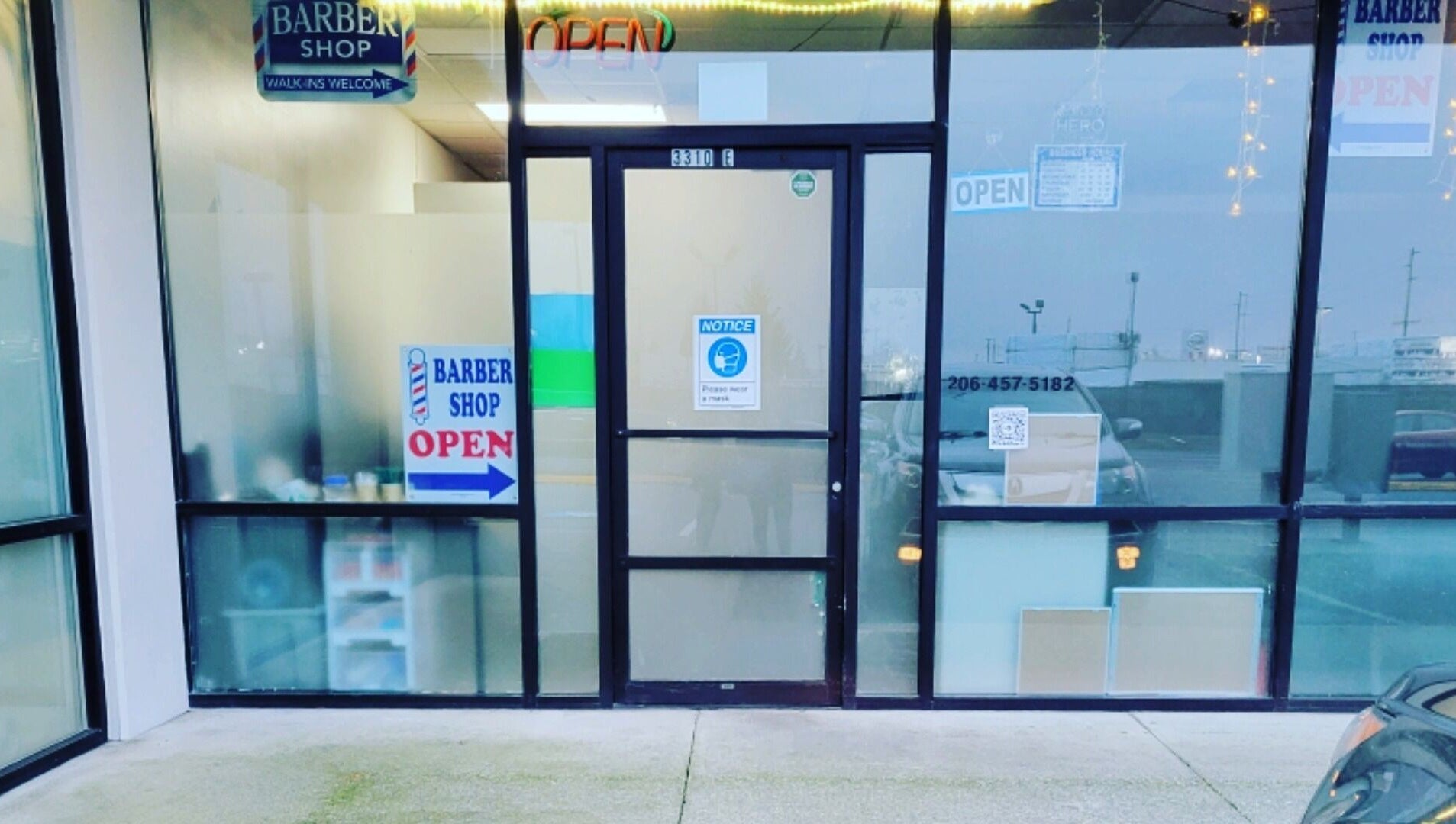 Front view of Rest, Relax, Rejoice Massage entrance in Auburn, Washington, US with open sign.