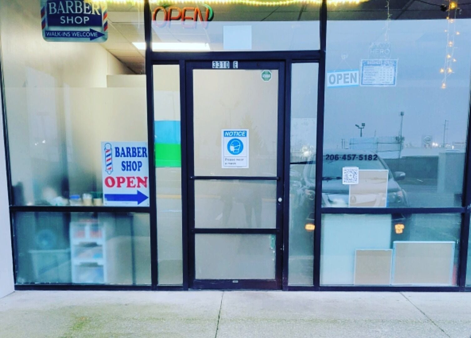 Front view of Rest, Relax, Rejoice Massage entrance in Auburn, Washington, US with open sign.