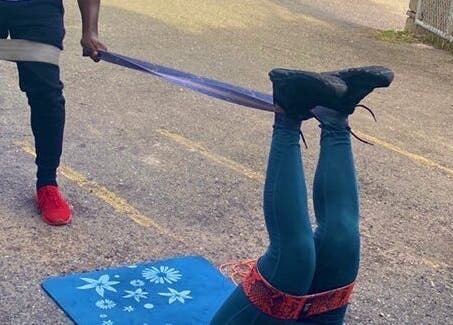 Open Beauty Divine Spa outdoor exercise with bands in Kingston, St. Andrew Parish, JM, promoting wellness.