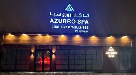 Front view of Azurro Spa by Niyama - Avani IBN Batuta, Dubai, AE, illuminated at night.