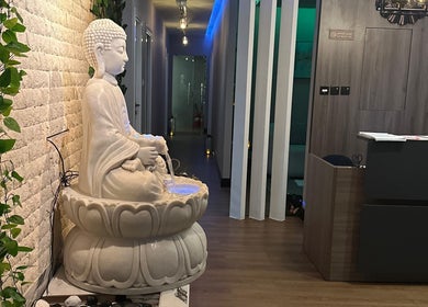 Serene Buddha fountain at the entrance of Azurro Spa by Niyama - Avani IBN Batuta, دبي, AE.