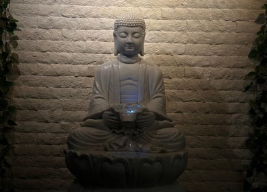 Tranquil Buddha statue at Azurro Spa by Niyama - Avani IBN Batuta, دبي, AE, enhancing relaxation.