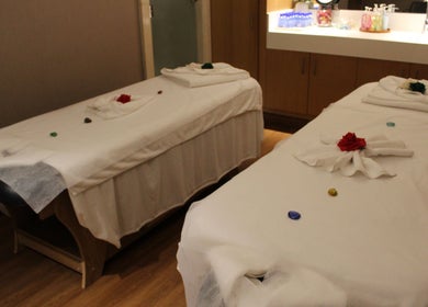 Relaxing massage tables at Niyama Spa at Hilton Garden Inn Albarsha, Dubai, Dubai, AE, with serene decor.