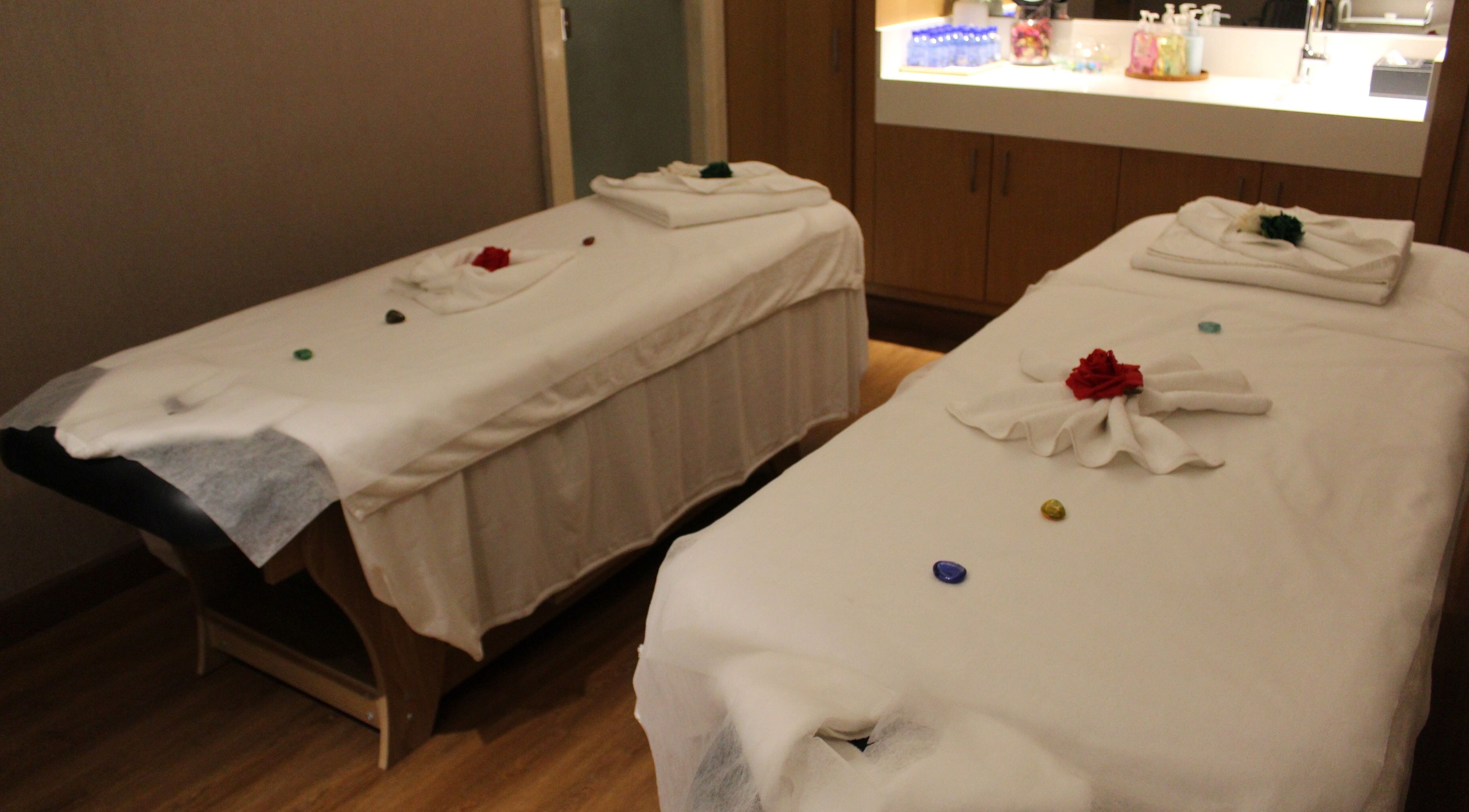 Relaxing massage tables at Niyama Spa at Hilton Garden Inn Albarsha, Dubai, Dubai, AE, with serene decor.