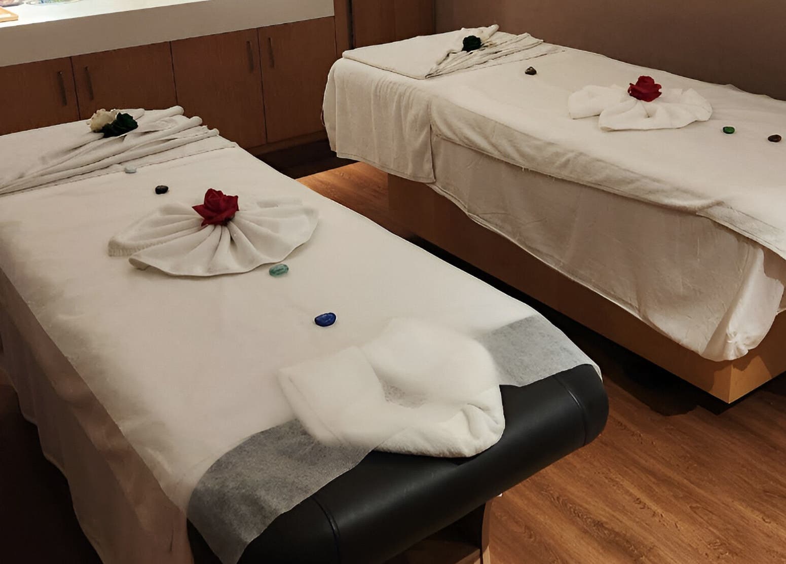 Luxurious massage tables at Niyama Spa, Hilton Garden Inn Albarsha, Dubai for ultimate relaxation.
