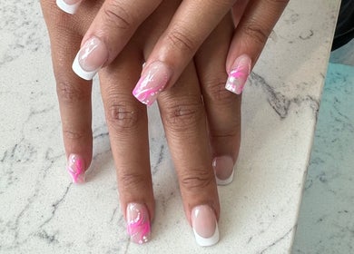 Beautiful pink and white nail art at Helen's Nails & Spa, Wildwood, Florida, US.