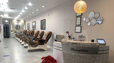 Modern pedicure stations and reception at Helen's Nails & Spa, Wildwood, Florida, US.