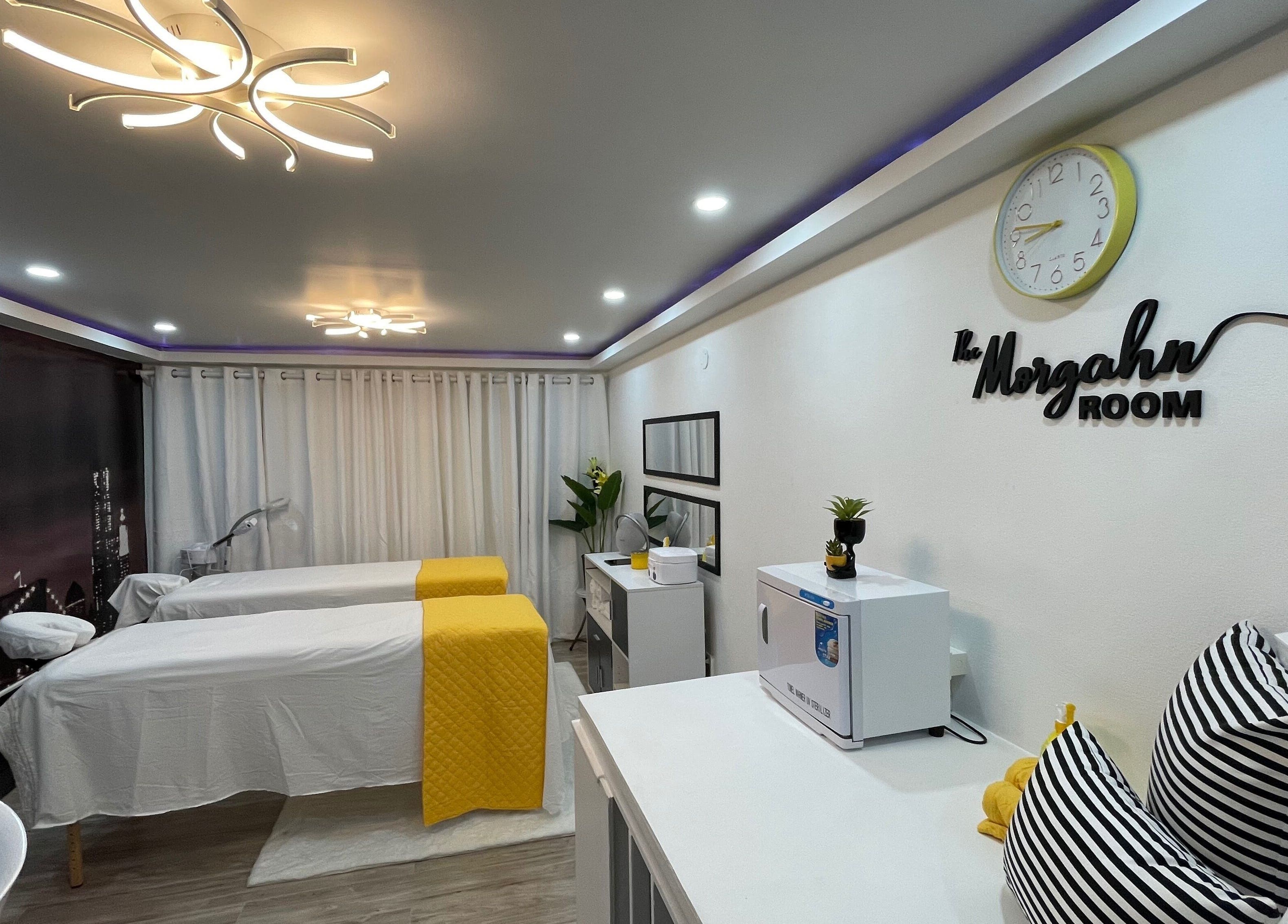 Tranquil spa treatment room at Beauty Statement Salon & Spa, Ocho Rios, JM with modern décor and twin beds.