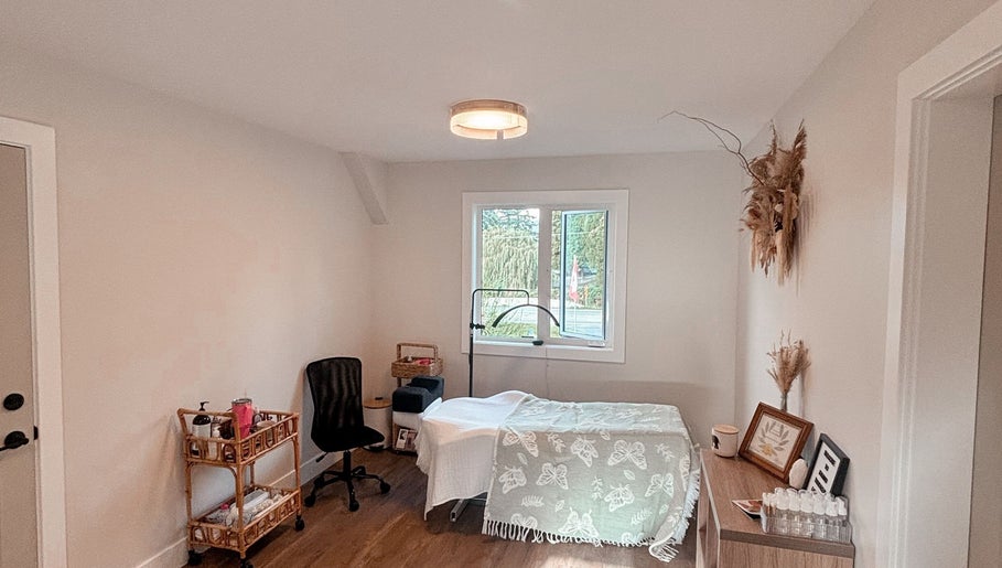 Relaxing treatment room at Studio 13 Esthetics in Chilliwack, British Columbia, CA, with natural decor and gentle lighting.