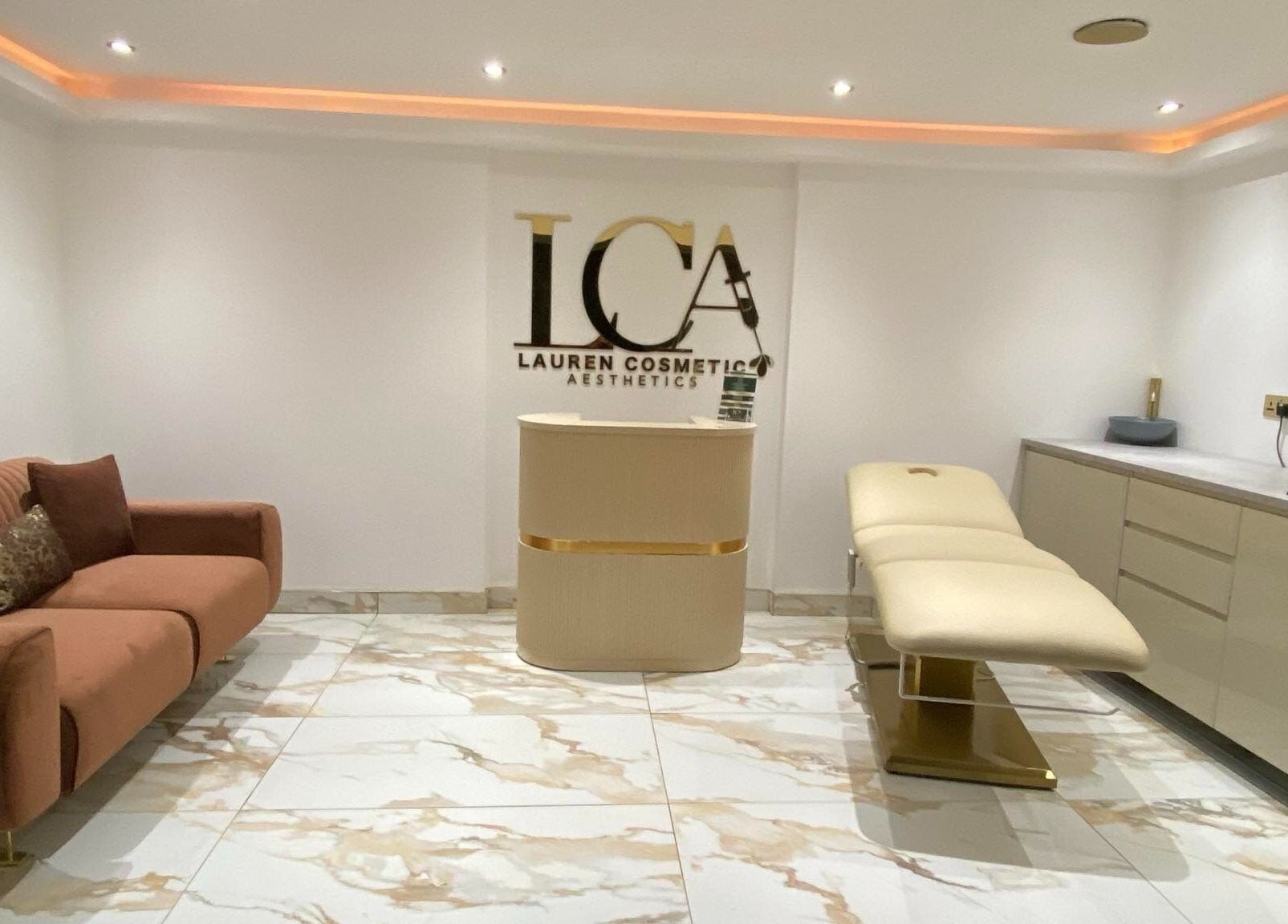 Luxurious spa room at Lauren Cosmetic Aesthetics in Wigan, England, GB with modern decor and plush seating.