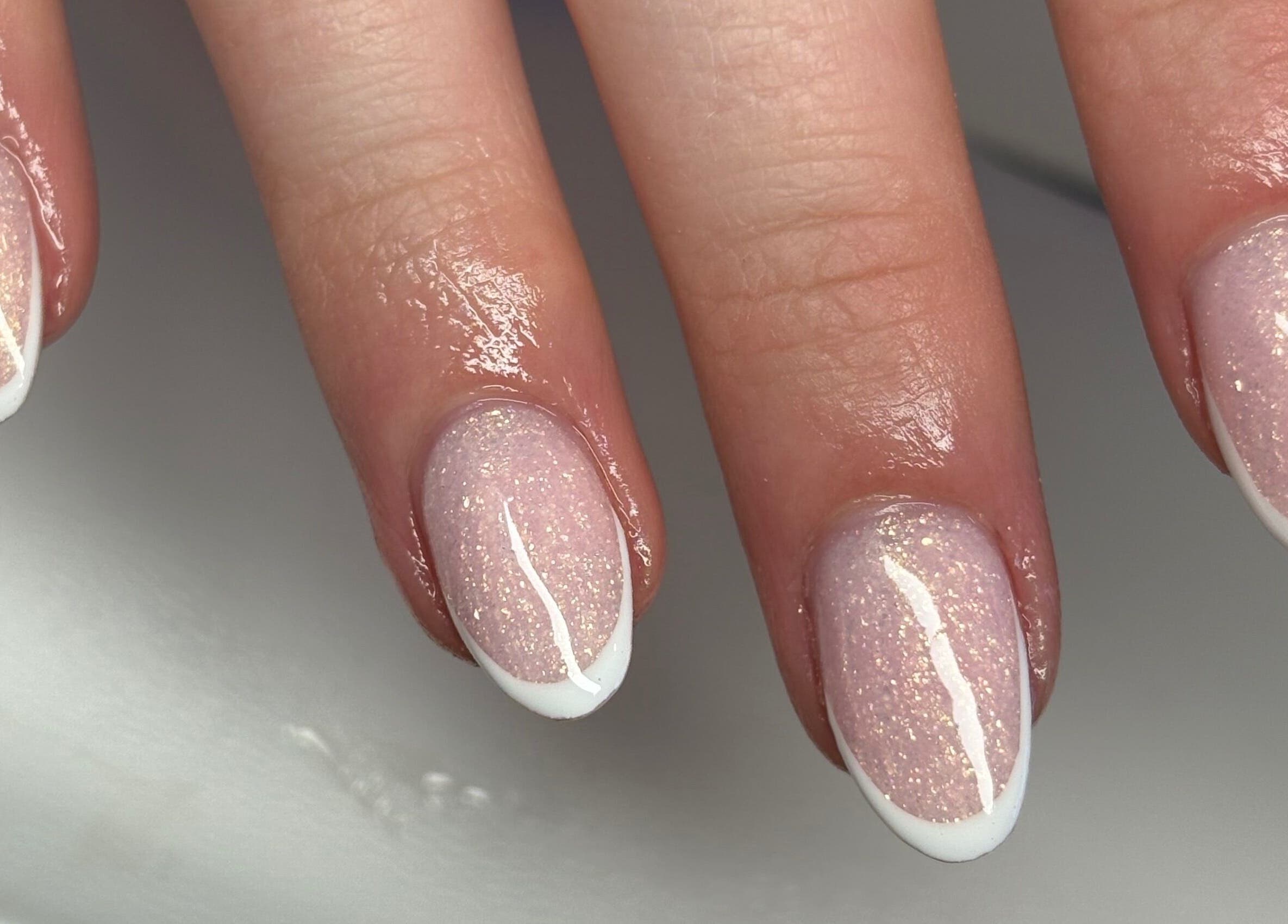 Elegant glitter French manicure at The Boujee Nail Club, Bathgate, Scotland, GB.