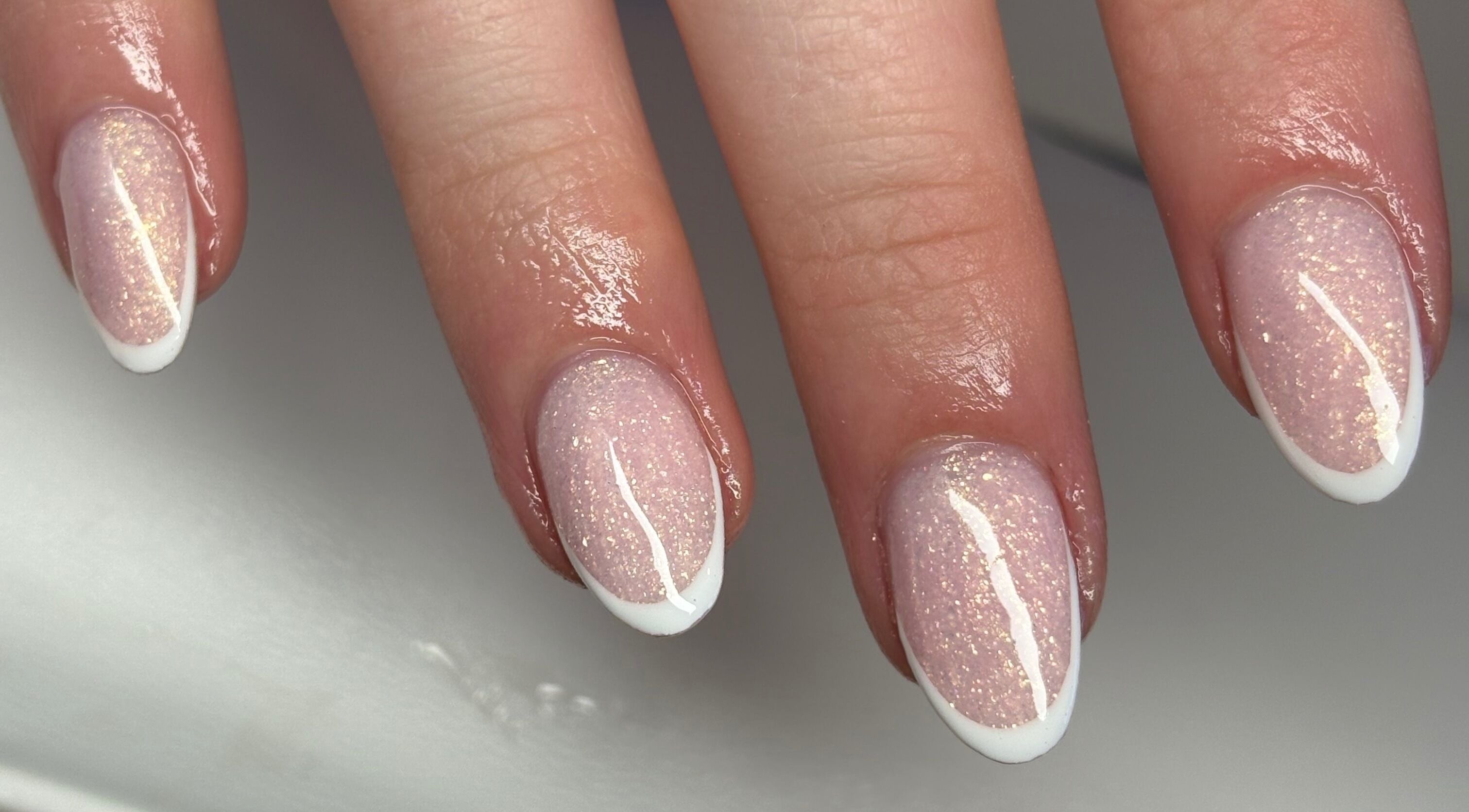 Elegant glitter French manicure at The Boujee Nail Club, Bathgate, Scotland, GB.