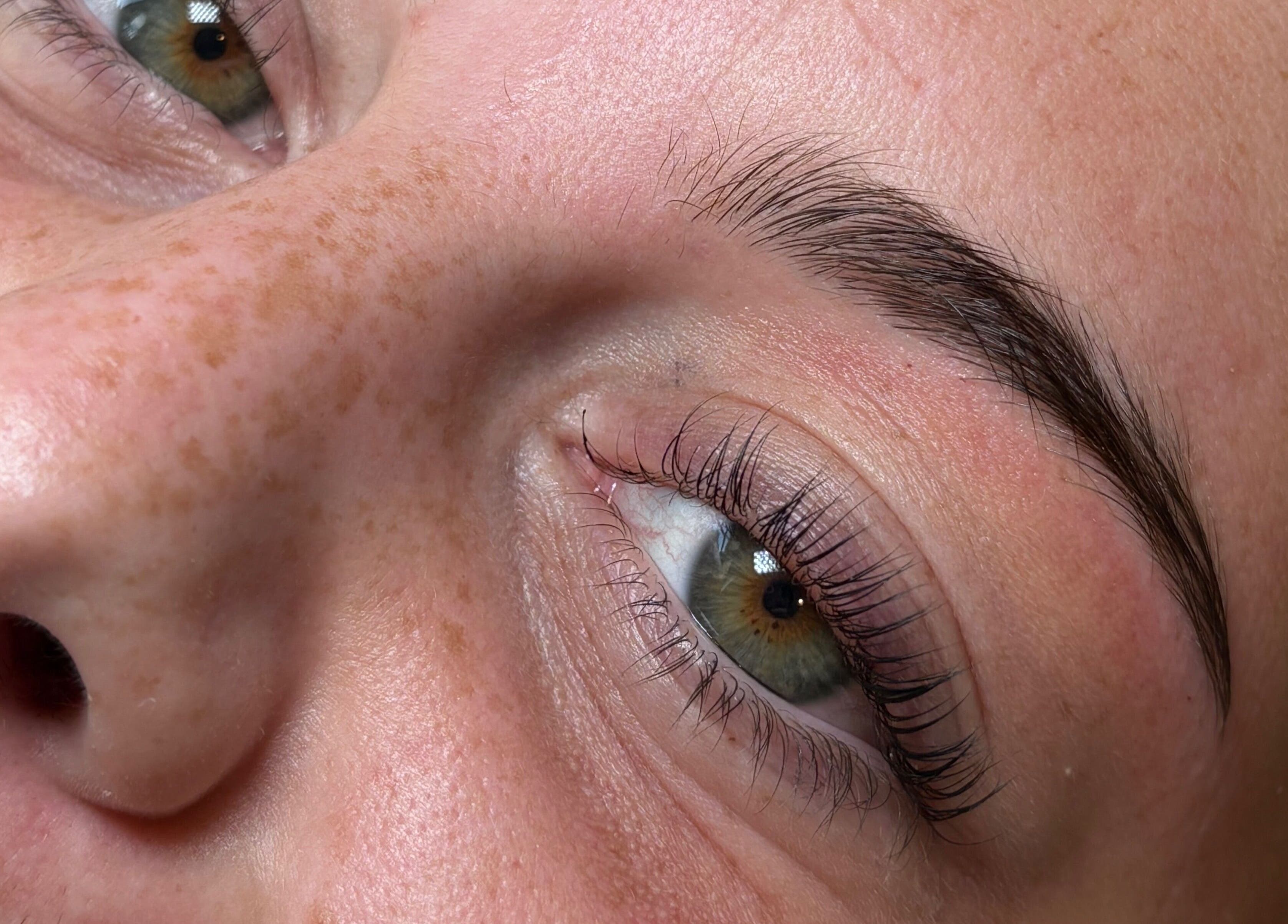 Closeup of groomed eyebrow and lashes at The Boujee Nail Club, Bathgate, Scotland, GB.
