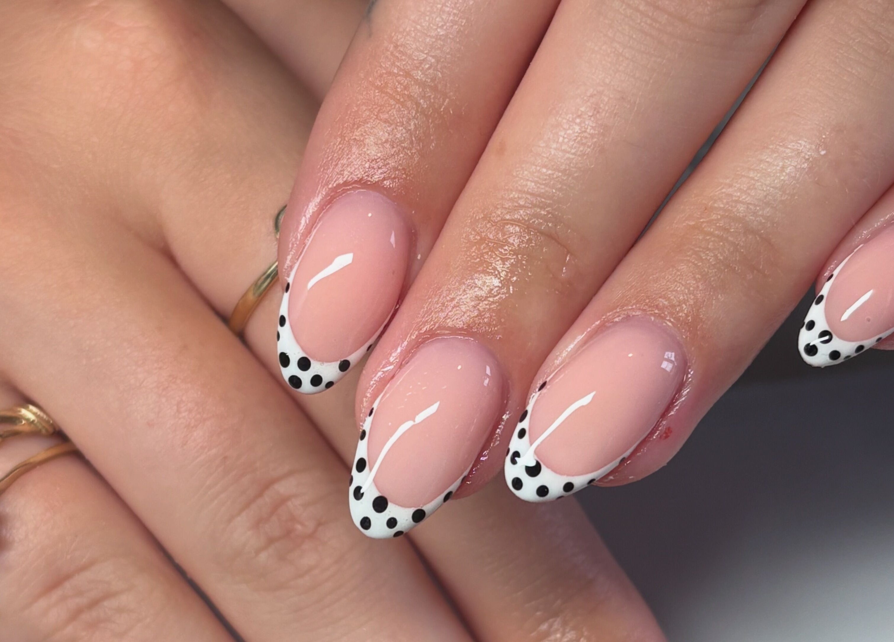 Chic polka dot nails at The Boujee Nail Club in Bathgate, Scotland, GB. Perfectly manicured hands.