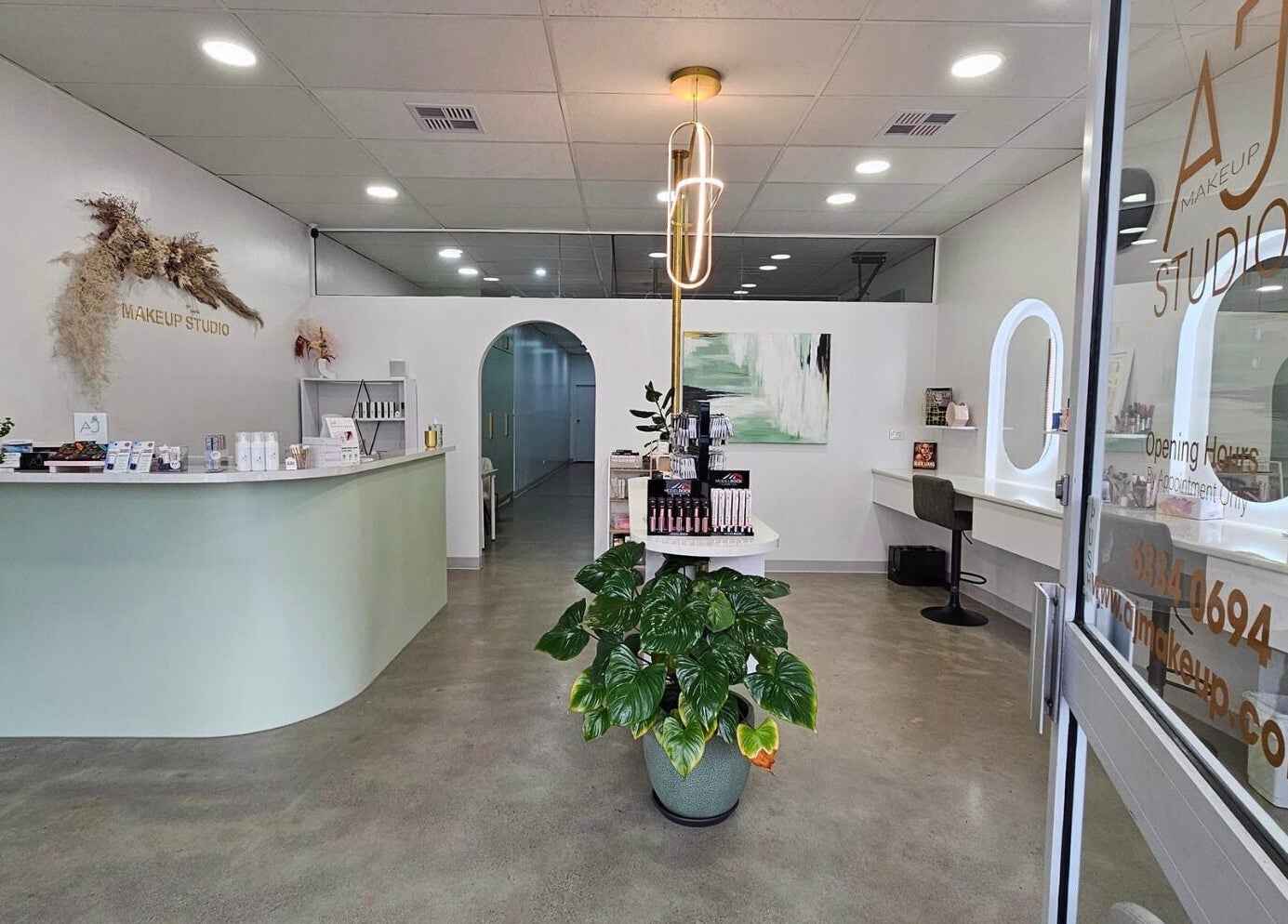 Interior of AJ Makeup Studio in Launceston, Tasmania, AU, featuring a sleek modern design with elegant decor.