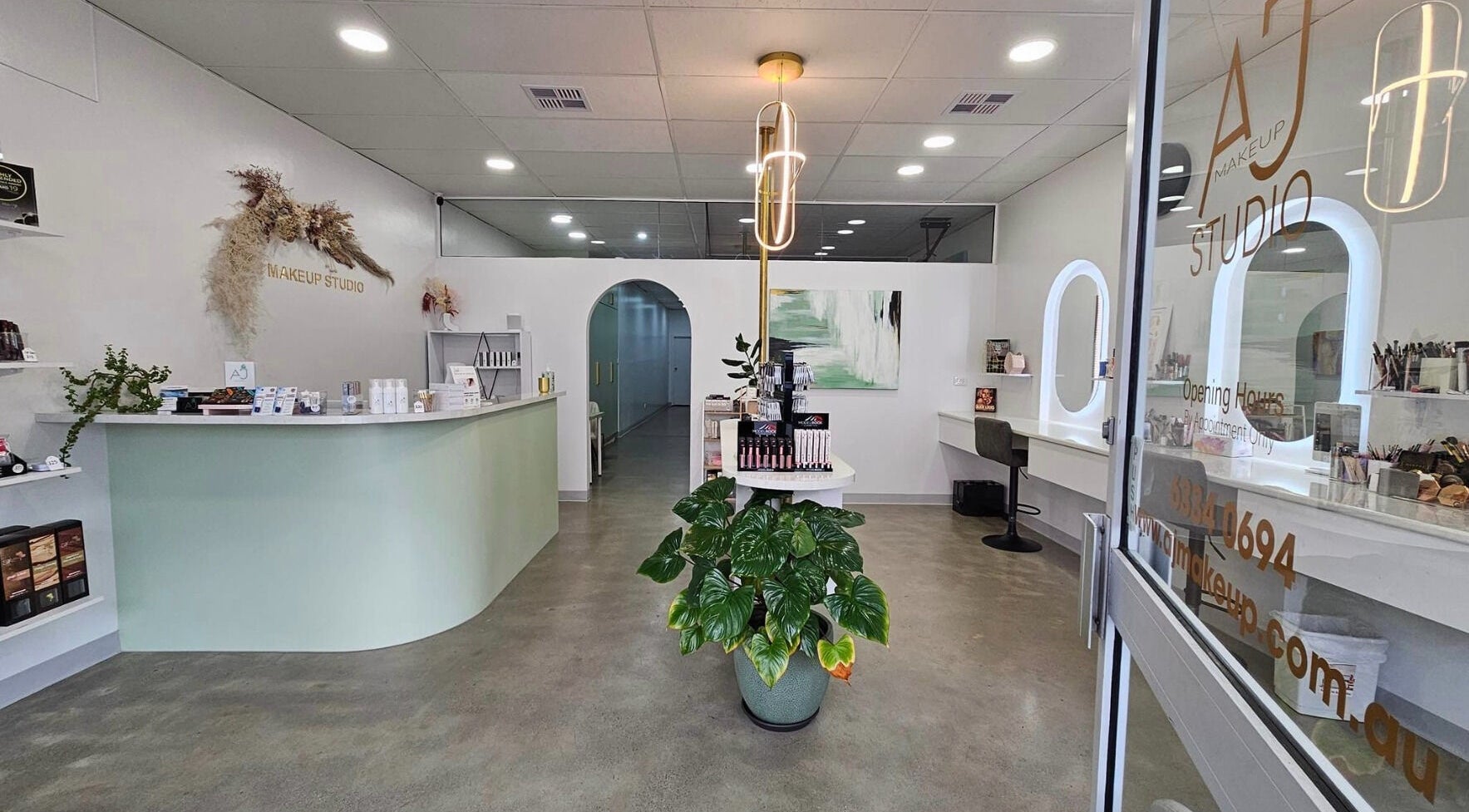 Interior of AJ Makeup Studio in Launceston, Tasmania, AU, featuring a sleek modern design with elegant decor.