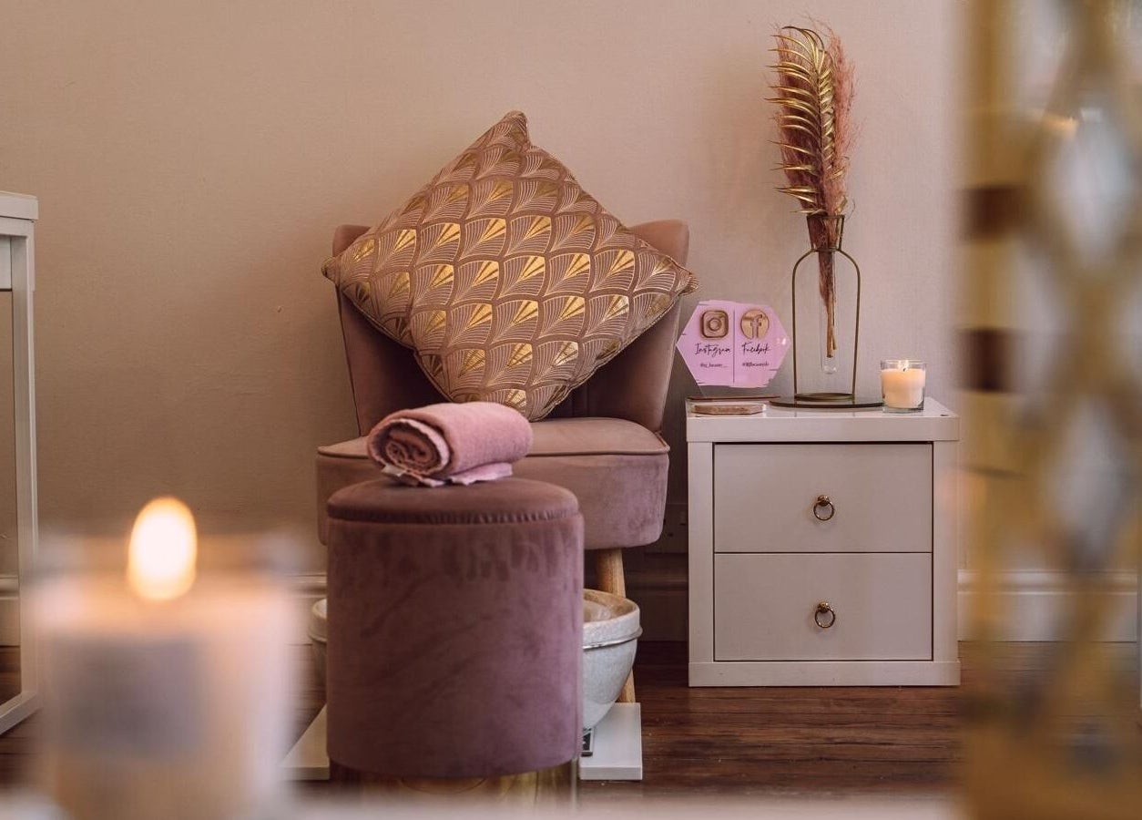 Elegant seating area at RJ Beauty, Halifax, England, GB featuring plush decor and a tranquil ambiance.