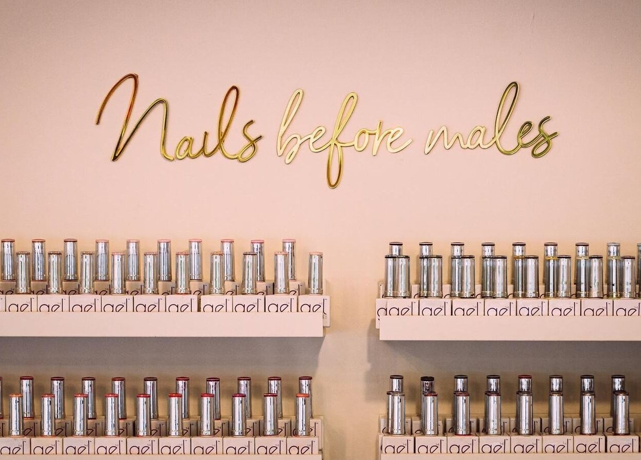 Elegant nail polish display at RJ Beauty, Halifax, England, GB, showcasing a chic salon vibe.