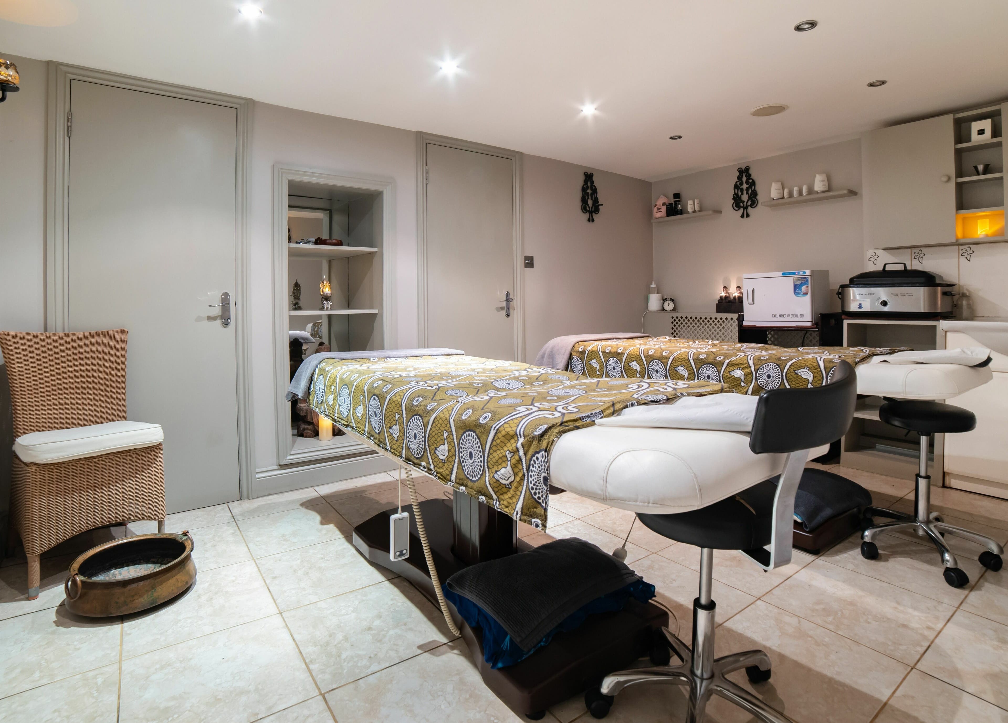 Relaxing massage room at Himalayan Springs Spa & Massage Centre, London, England, GB.