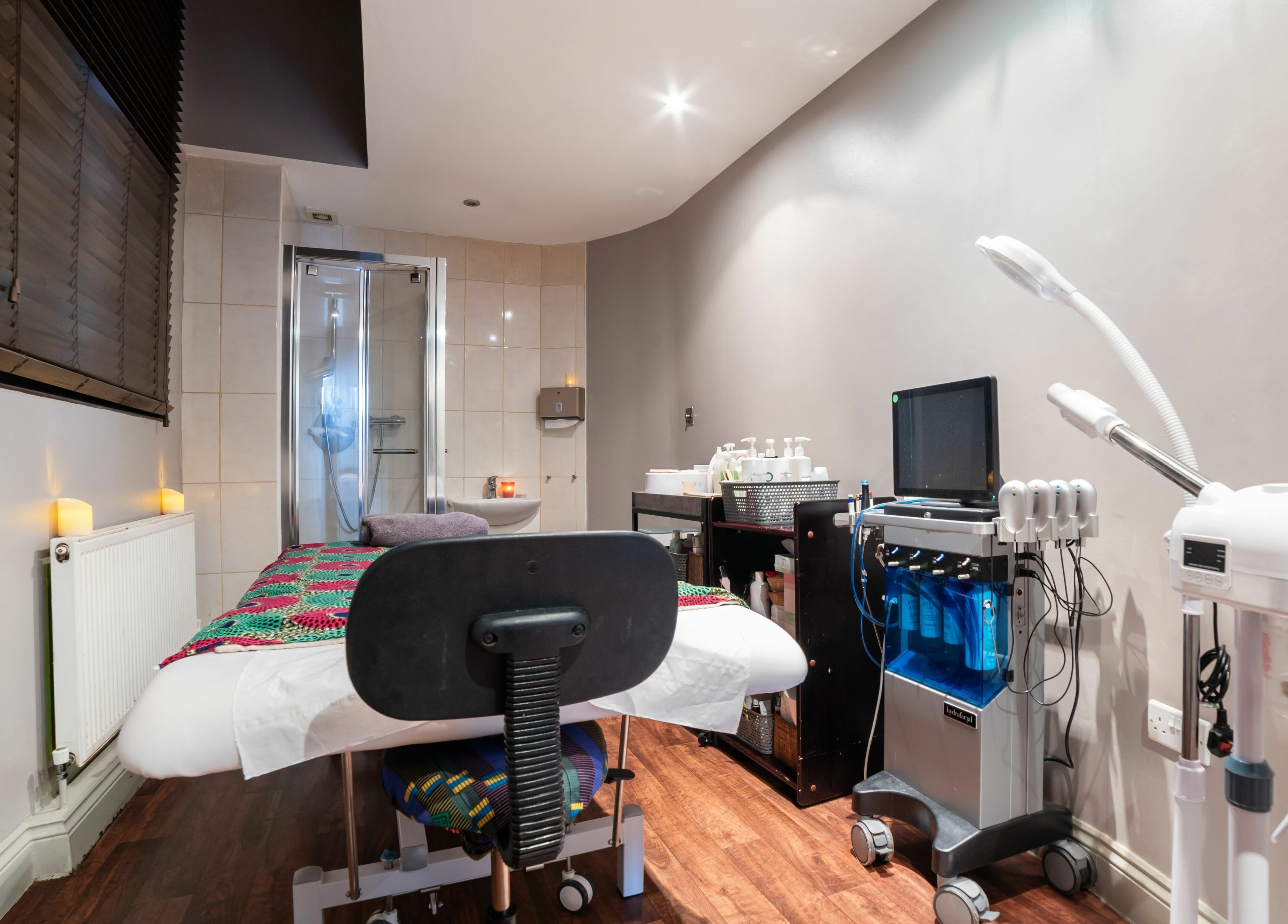 Relaxing treatment room at Himalayan Springs Spa & Massage Centre, London, England, GB with modern amenities.