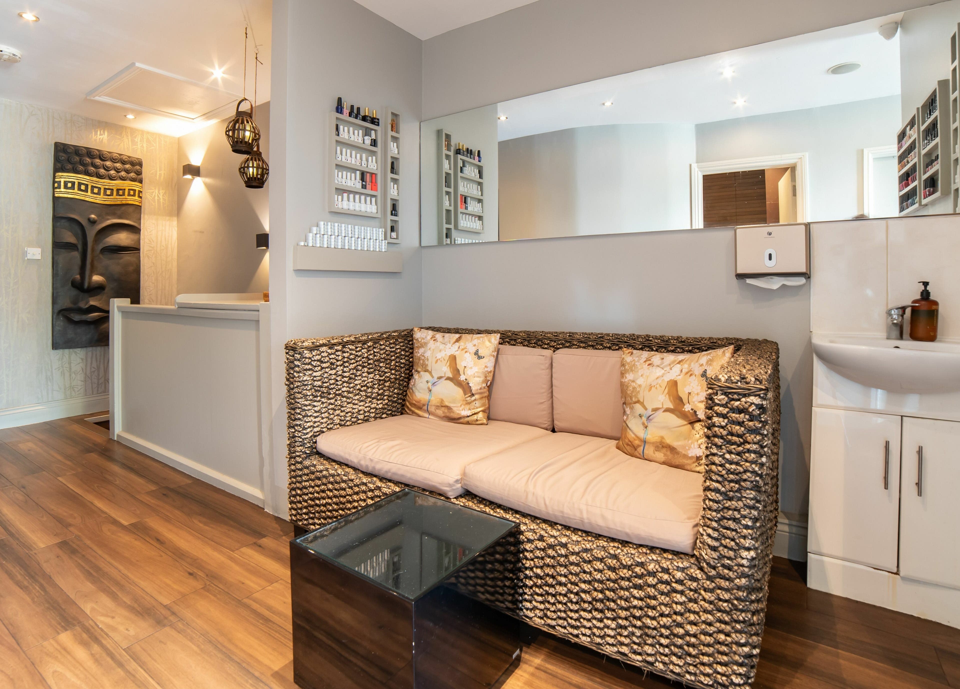 Relaxing lounge at Himalayan Springs Spa & Massage Centre, London, England, GB with plush seating and decor.