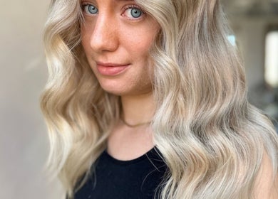 Blonde waves styled at Rogue & Vow in Blidworth, England, GB showcasing expert hairdressing.