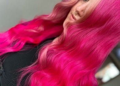 Bright magenta hair waves styled at Rogue & Vow, Blidworth, England, GB.