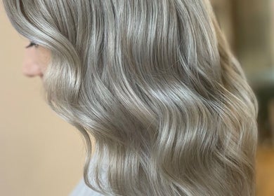 Silvery wavy hairstyle at Rogue & Vow, Blidworth, England, GB, exemplifying elegant hair design.