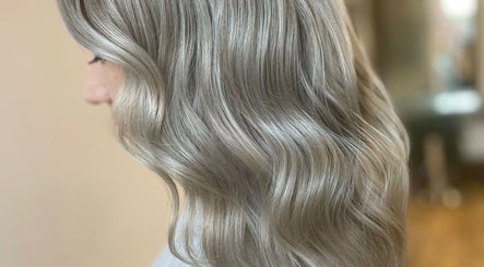 Silvery wavy hairstyle at Rogue & Vow, Blidworth, England, GB, exemplifying elegant hair design.
