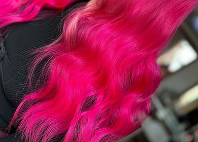 Vibrant pink hair styling at Rogue & Vow, Blidworth, England, GB.