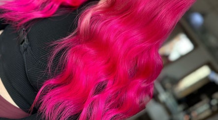 Vibrant pink hair styling at Rogue & Vow, Blidworth, England, GB.