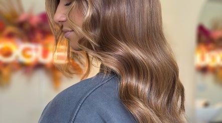 Elegant wavy brown hairstyle at Rogue & Vow, Blidworth, England, GB.
