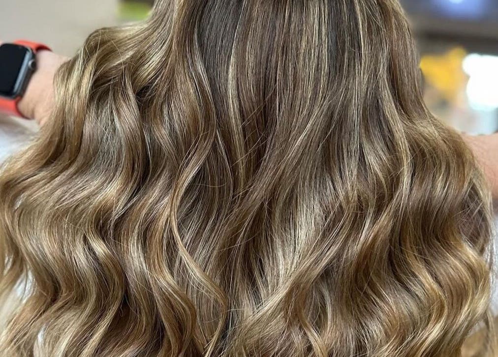 Luxurious wavy hair styling at Rogue & Vow, Blidworth, England, GB. Perfect for elegance and shine.