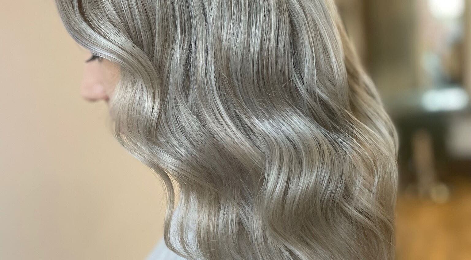 Elegant silver hair waves styled at Rogue & Vow, Blidworth, England, GB. Perfect blend of modern and chic.