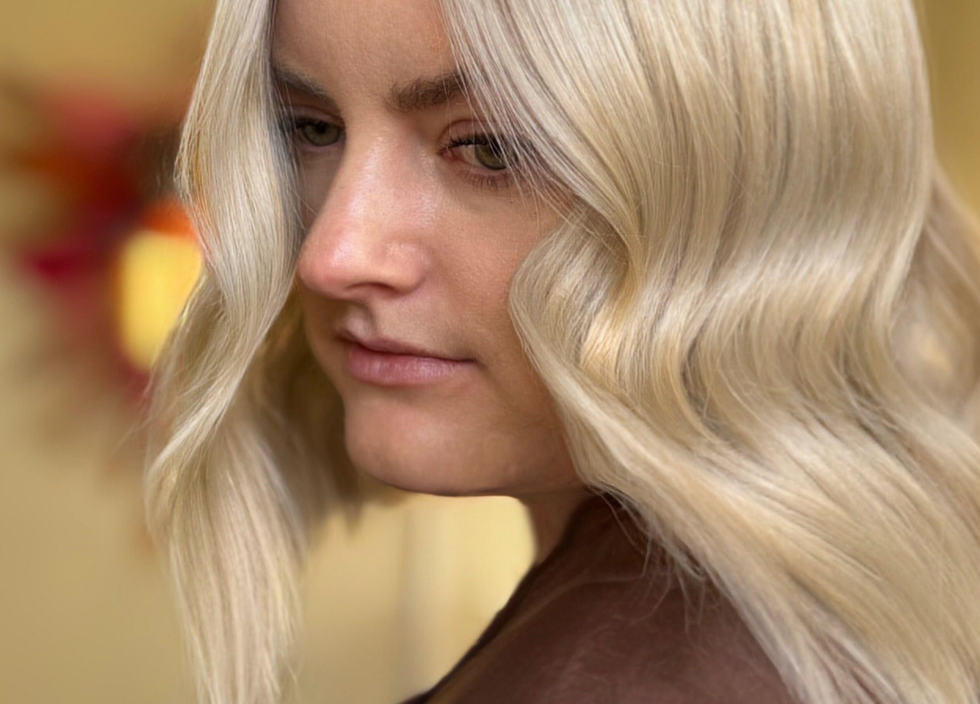 Blonde waves styled at Rogue & Vow in Blidworth, England, showcasing expert hairdressing services.