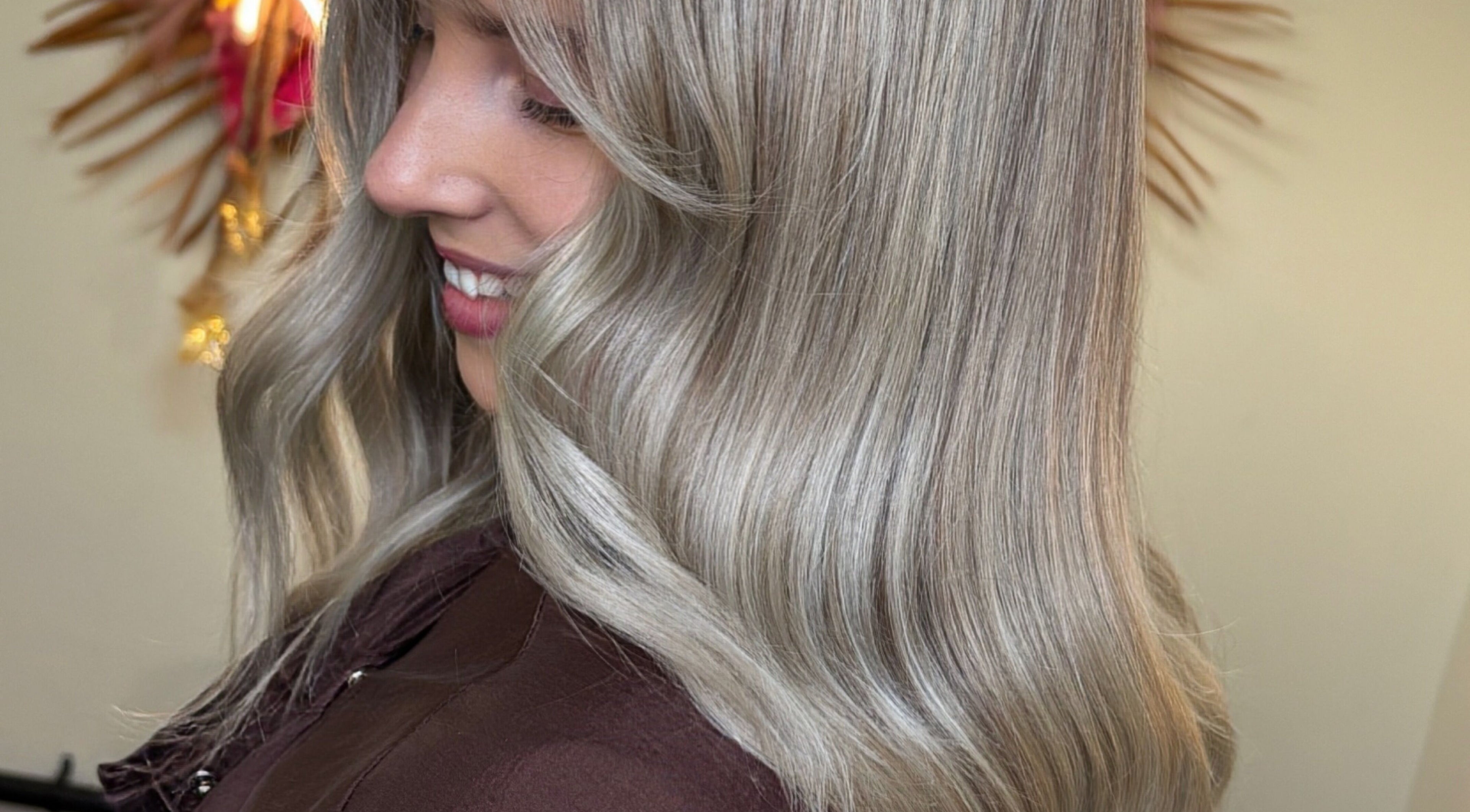 Silky silver hair waves styled at Rogue & Vow salon in Blidworth, England, GB for a chic look.
