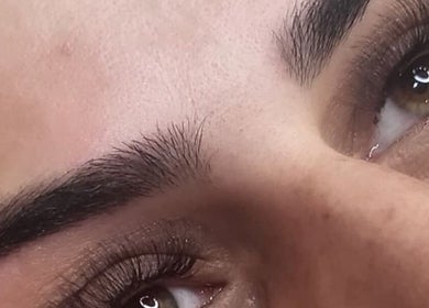 Close-up of eyelashes and eyebrows at Jos Beauty Cabin, Alexandria, Scotland, GB showcasing meticulous beauty.