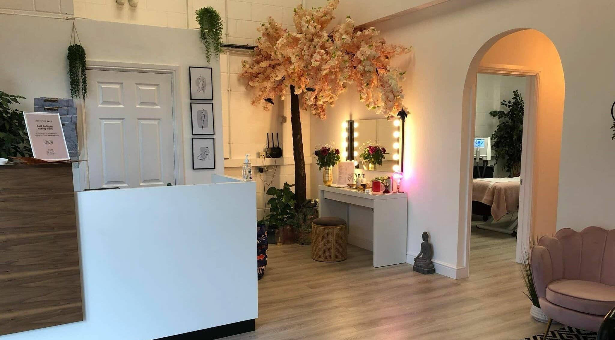 Hayley’s Hair Removal and Aesthetics interior in Poole, England, GB, showing elegant seating and decor.