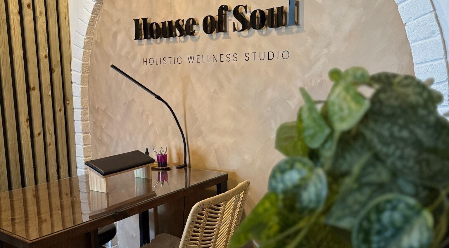 Reception area of House of Soul Fulwood, Preston, England, GB featuring a desk and plant decor.