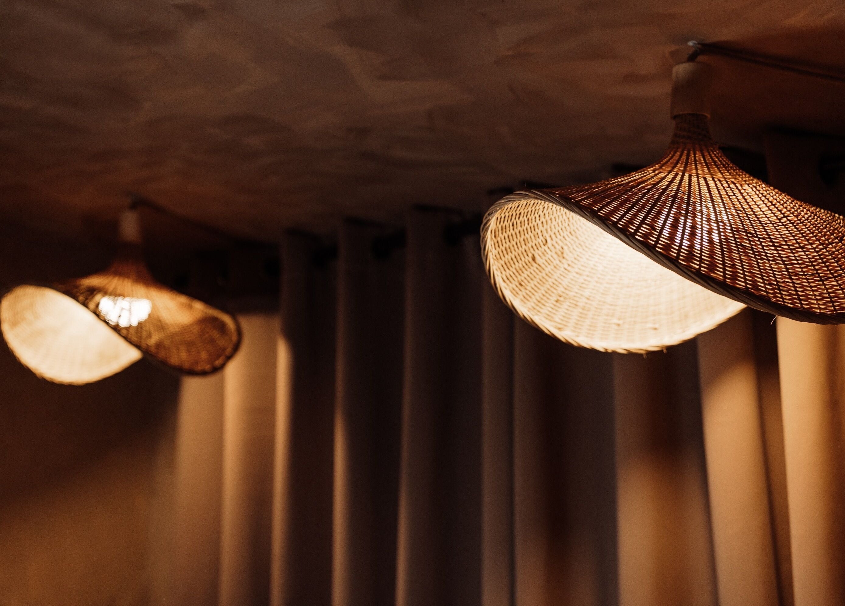 Warm rattan light fixtures at House of Soul Feniscowles, Feniscowles, England, GB creating a cozy ambiance.